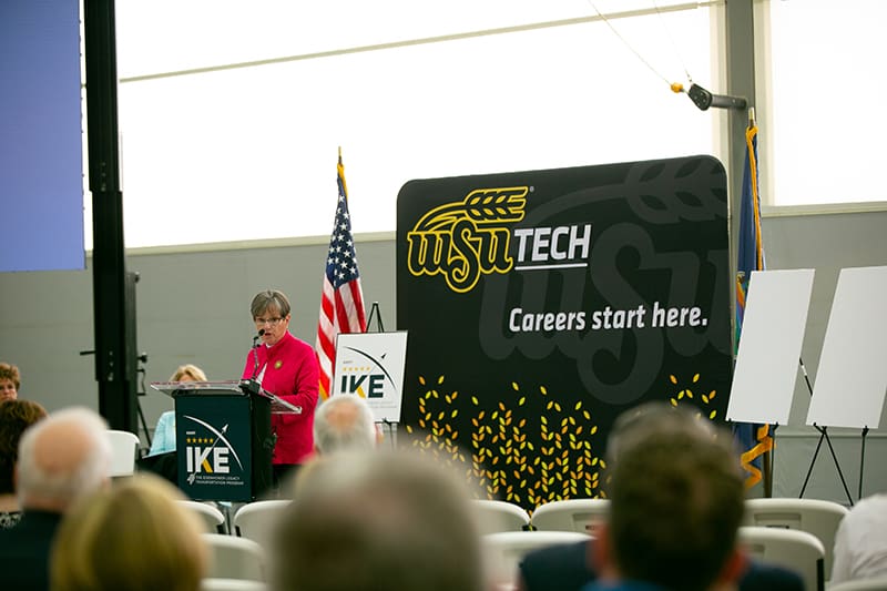 Gov. Laura Kelly speaks to a crowd at WSU Tech. on a