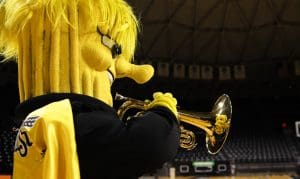 Picture of Wu playing trumpet.