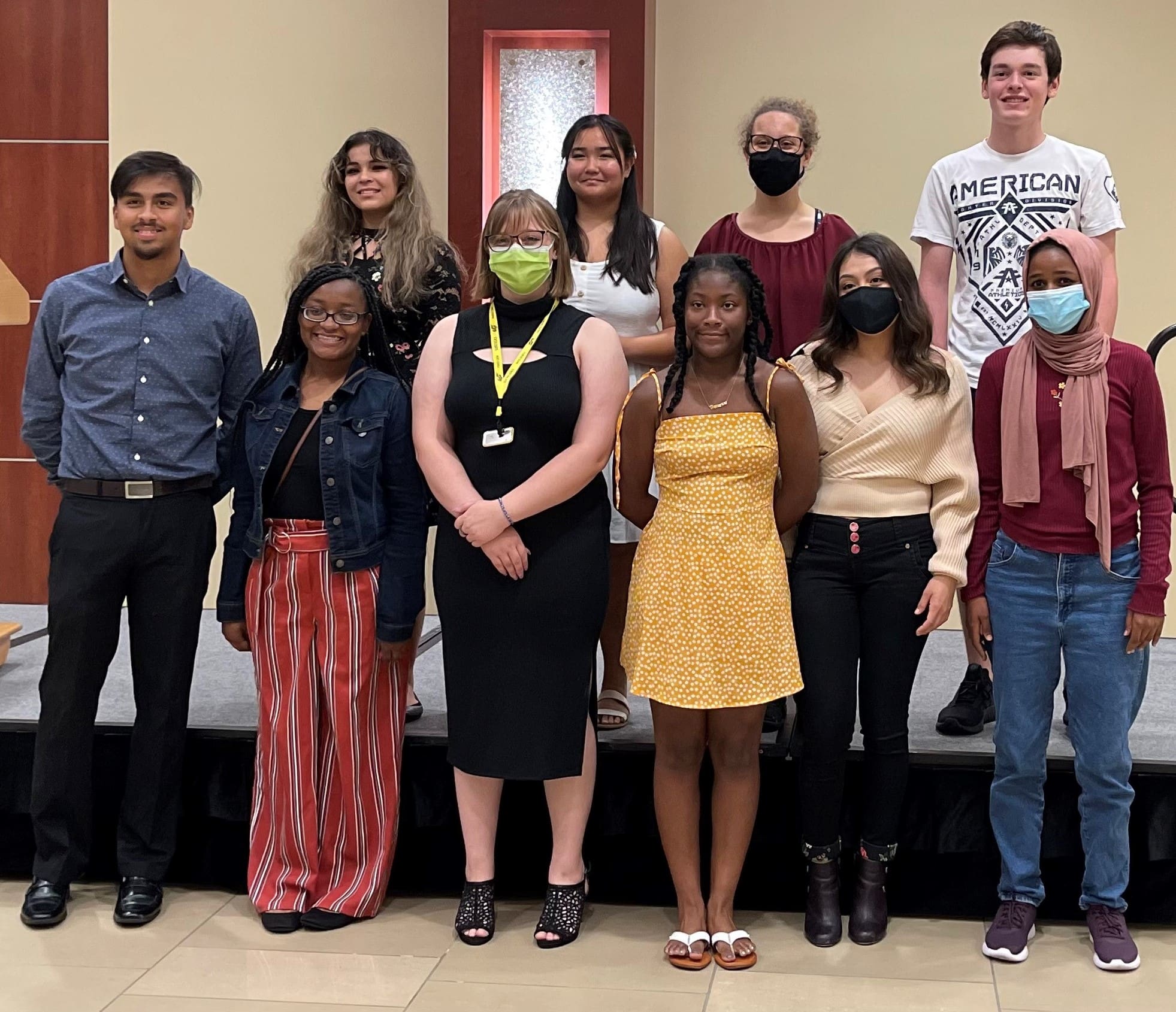A picture of 10 students who received the Shocker Neighborhood Promise Scholarship.