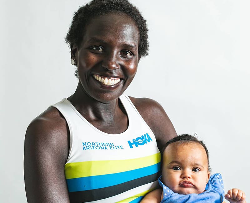 Picture of Olympian Aliphine Tuliamuk and daughter Zoe.