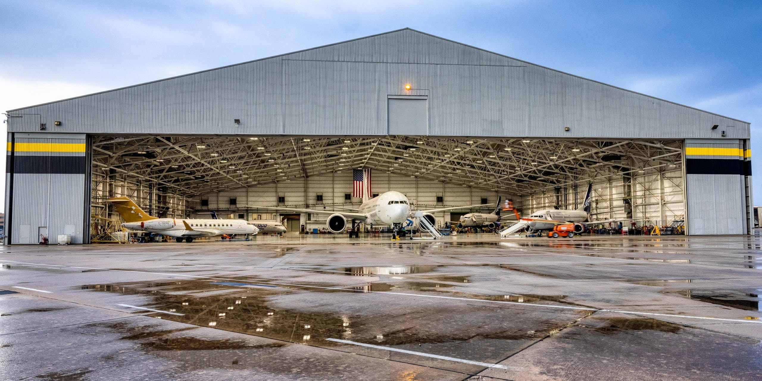 An image featuring Boeing 777-300ER passenger aircraft is parked in Wichita State University's National Institute for Aviation Research facilities.