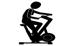 Charicature in black on a stationary bike.