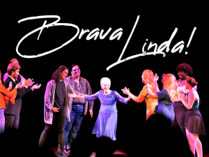 Picture of Linda Starkey with nine members of the school of performing arts and the text 'Bravo Linda!'