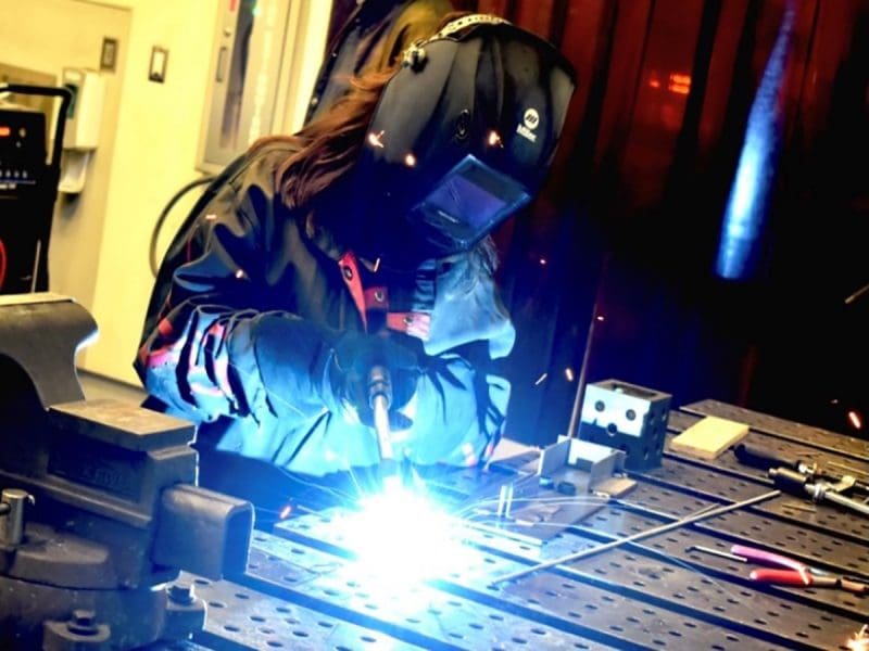 A Wichita State student welds as part of a class project at GoCreate located on the Innovation Campus.