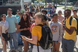 Picture of Transition Mentor leading campus tour during Orientation