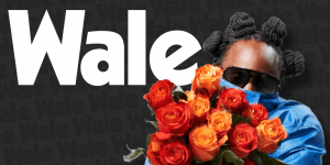 The image contains large text of the artists name and Wale a photo of the artists face partially concealed by a bouquet of roses he is holding.
