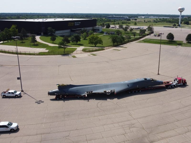 Image of a B-1B Lancer being towed to WSU's NIAR Facility.