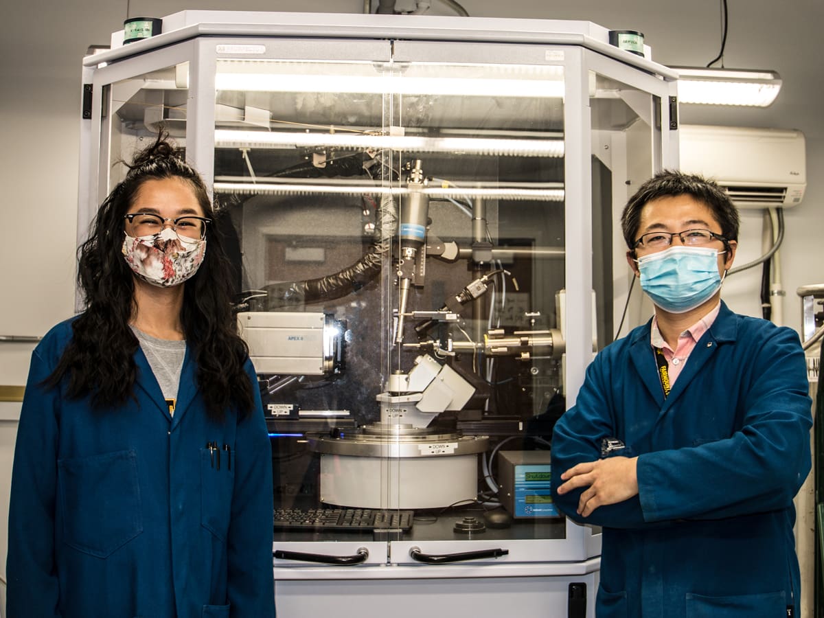 Vivian Nguyen and Jian Wang with Wichita State University use the single crystal X-ray diffractometer to visualize atoms. An atom is about the size of 1/100,000 of our hair.