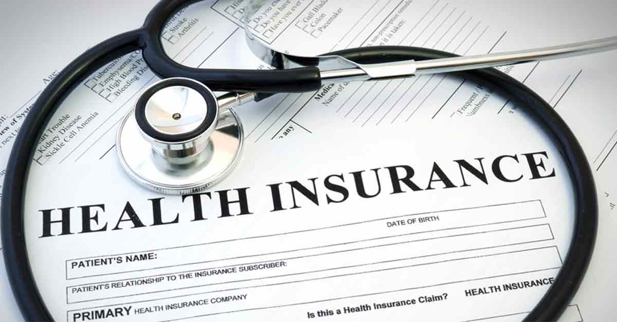 Health Insurance paper with stethoscope