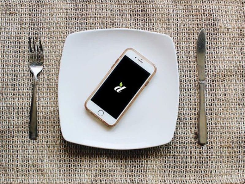 Dine on Campus app on a plate