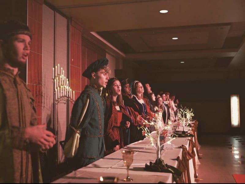Student performances at a past Madrigal Feast