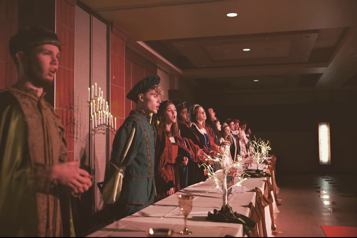 Student performances at a past Madrigal Feast