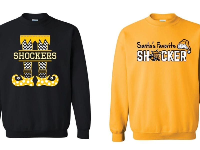 Yellow Crewneck Sweatshirt with Santa's Favorite SHOCKER written on two lines... there is also a Santa Hat above the R of Shocker and wu as the O in Shocker. Black crewneck sweatshirt with SHOCKERS written on top for elf legs that have yellow black and white designs on them