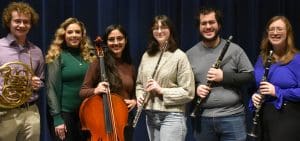Photo of the six student soloists: Nicholas Welicky, horn; Ashley Ruckman, soprano; Mengielly Diaz Cortes, cello; Sarah Rodriguez, flute; Brandon Rodriguez, clarinet; and Elyssa Astegiano, clarinet.