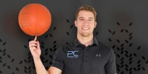 Photo of Jacob O'Connor spinning a basketball on his finger.