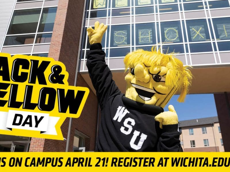 Photo of WhuShock with the text, "Black & Yellow Day: Join us on campus April 21! Register at wichita.edu/visit."