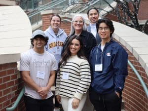 A photo of Dr. Heidi Bell and the five exercise science students that participated in the sports medicine conference.