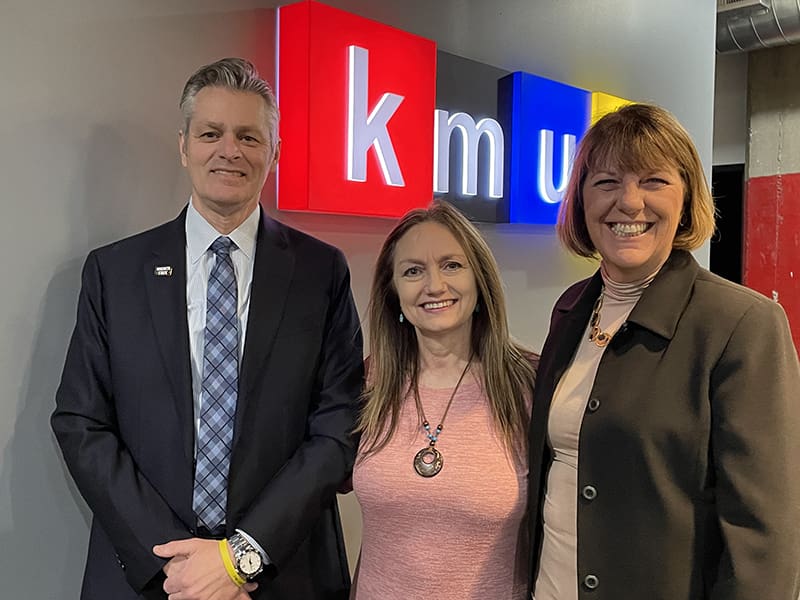 Photo of President Rick Muma; Debra Fraser, KMUW's general manager; and Shirley Lefever, executive vice president and provost.