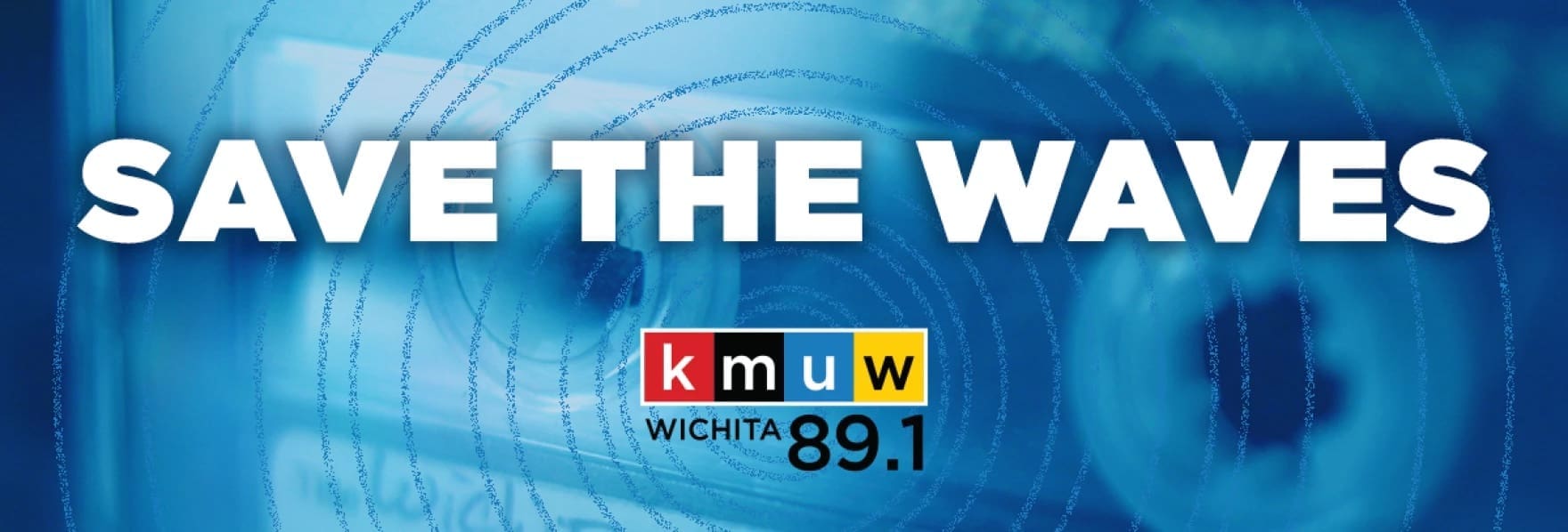 A graphic with the text, "Save The Waves" and the KMUW logo. "KMUW 89.1 FM," and a photo of a cassette tape as the backdrop.