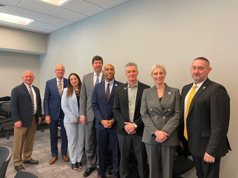 Photo of President Rick Muma alongside members of the Bureau of Alcohol, Tobacco, Firearms and Explosives, and the Bureau of Justice Assistance.