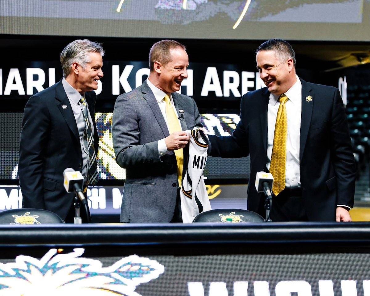 Photo of President Rick Muma, new men's basketball coach Paul Mills and Director of Athletics Kevin Saal at Thursday's introduction event.