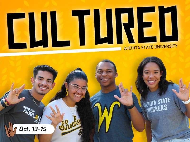 The picture is of four students holding the WuShock sign and the date October 13-15 at the bottom.