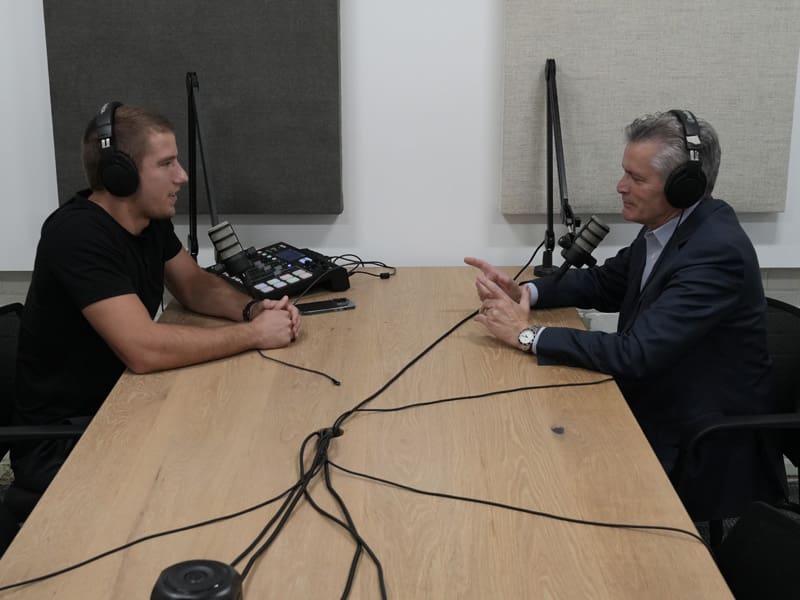 President Rick Muma and Jacob O'Connor talk in the Real Conversations podcast studio