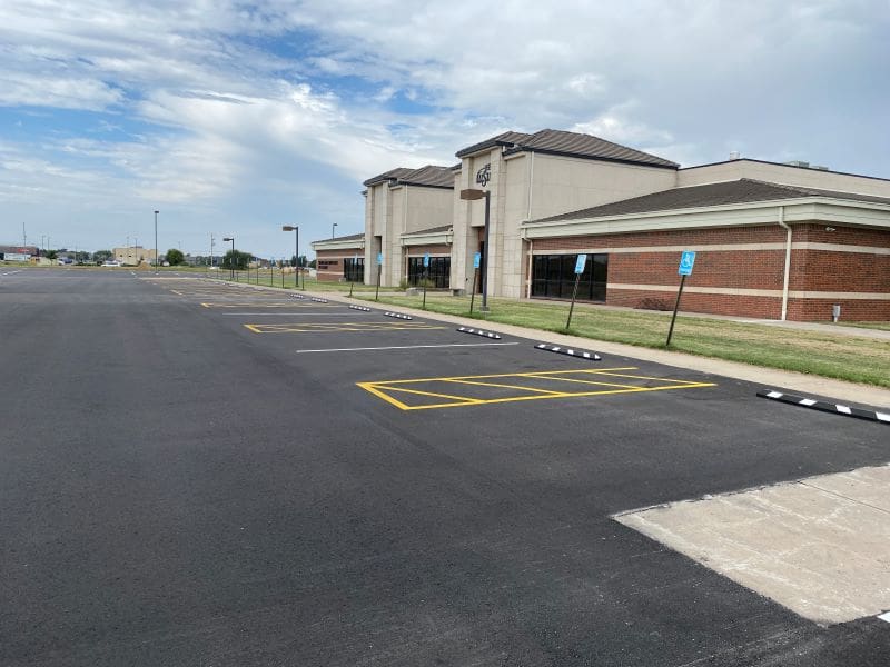 A photo of the newly refinished ADA parking spots outside WSU-West.