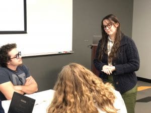 Casey Shotwell, assistant educator, providing free math assistance to students