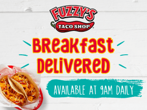 Tacos on a plate with the text, Fuzzy's Taco Shop breakfast delivered available 9 a.m. daily