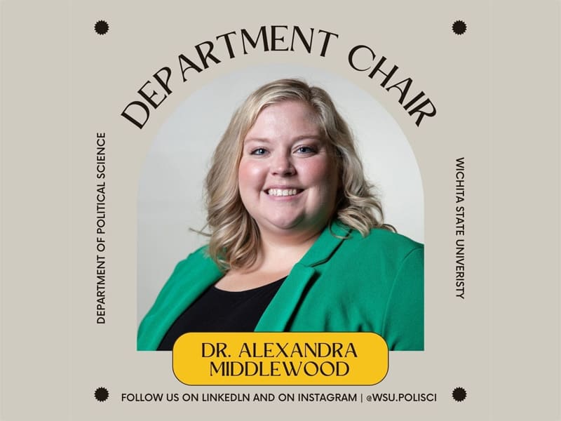 Dr. Alex Middlewood (white, blonde hair, green blazer, and a black top) is centered on the graphic with black mutlipointed stars in each four corners. There is a curved title above the photo that says "Department Chair", and below the photo it states "Dr. Alexandra Middlewood." There is sideways text on each side of Dr. M: the left saying "Department of Political Science" and the right "Wichita State University." At the bottom of the graphic, it states "Follow us on LinkedIn and on Instagram"