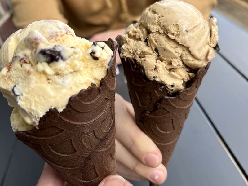 Patrons holding two ice cream cones at Papa's in Wichita.