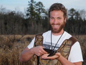 Tom Luhring on location studying river wildlife
