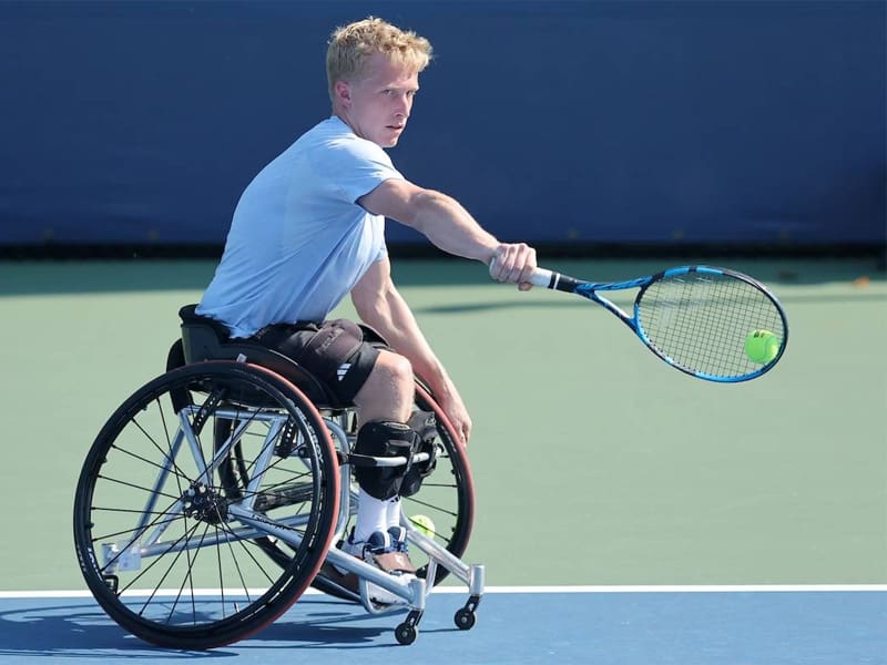 Casey Ratzlaff competes in a tennis match