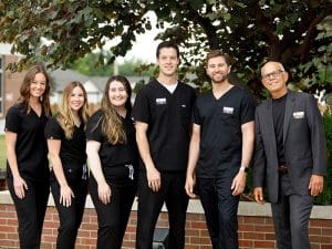 AEGD resident dentists with program director Dr. Dean Elledge.