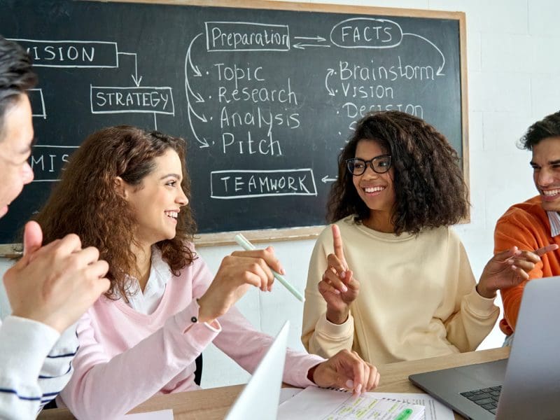 Students working at a desk