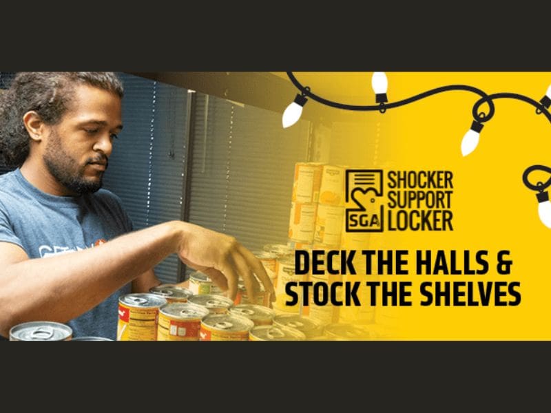 The image contains a photo of a person stacking canned food with the following text: Shocker Support Locker, Deck the Halls & Stock the Shelves. A decorative strand of lights overlays the image in the top right hand corner.