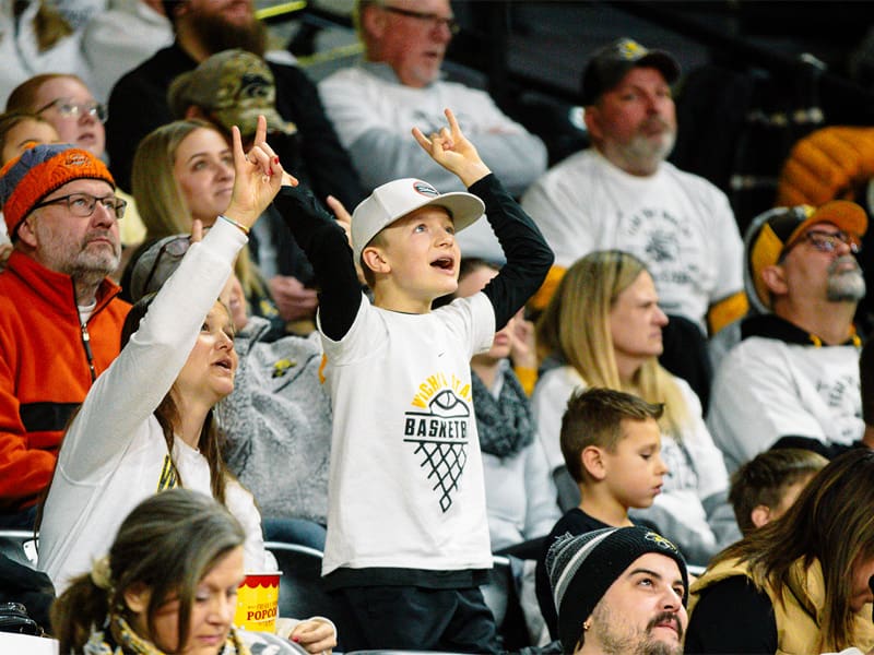 Fans cheer for the Shocker basketball team at Charles Koch Arena