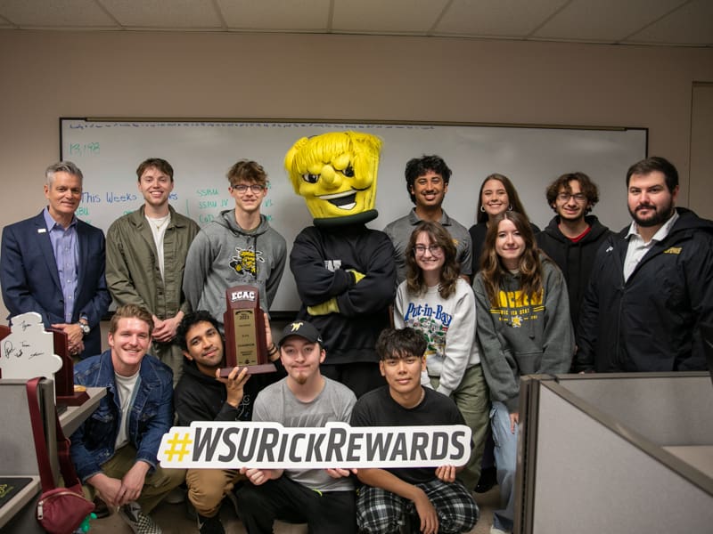 President Rick Muma and WuShock pose with the Wichita State Esports staff and roster for Rick Rewards