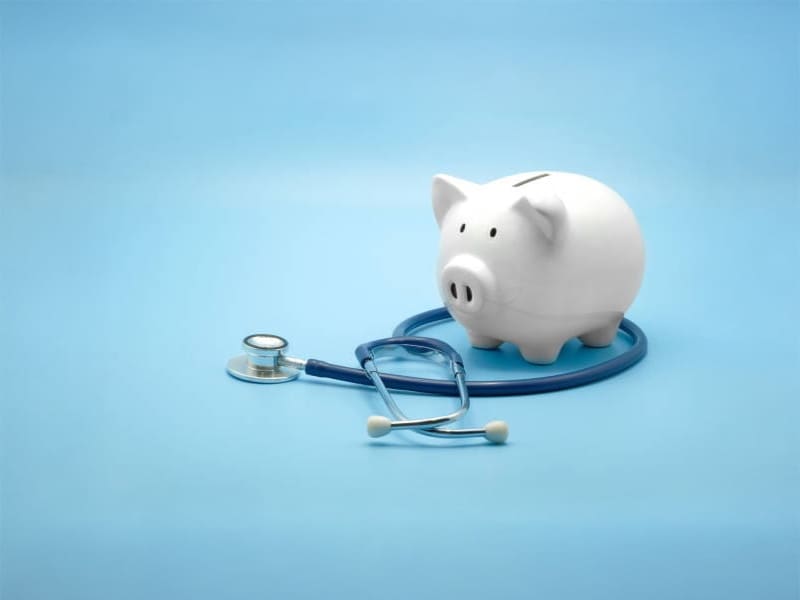 Piggy bank with stethoscope