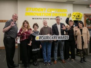 The Office of the Provost poses with President Rick Muma and WuShock