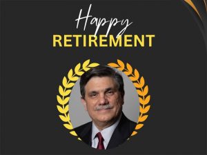 "Happy retirement" with a photo of Anthony Vizzini