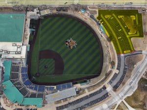 An overhead photo of Eck Stadium with the closed parking lot highlighted in yellow in the top right corner