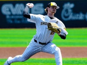 Grant Adler winds up a pitch at a game
