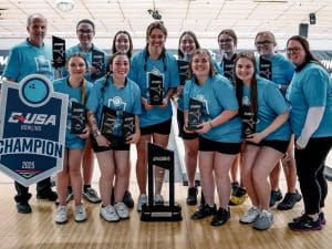 The Shocker women's bowling team members poses with their CUSA Championship trophies.