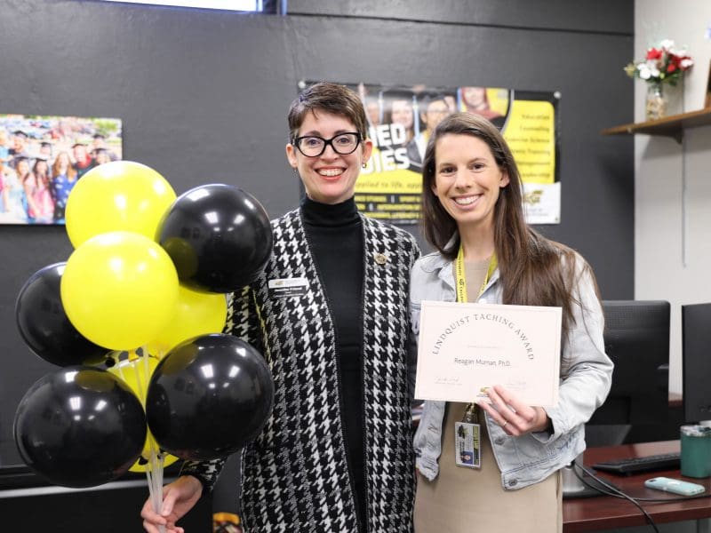 CAS Dean, Dr. Jennifer Friend with Dr. Reagan Murnan, recipient of the Lindquist Teaching Award and Young Faculty Scholar Award