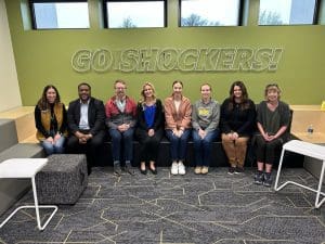 24-25 Recruitment Faculty Fellow pose for a photo in the Shocker Success Center.