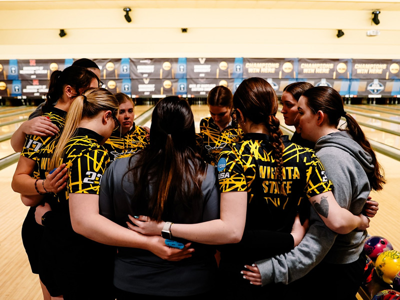 The Shocker women's bowling team deliberates during the NCAA Final Four