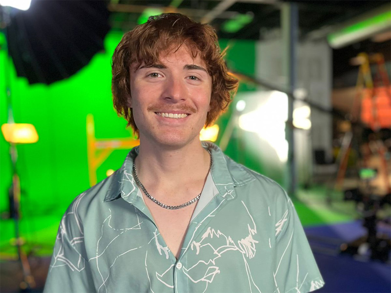 Luke Parrett poses at Shocker Studios