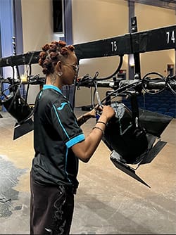 Lena working on theatre set